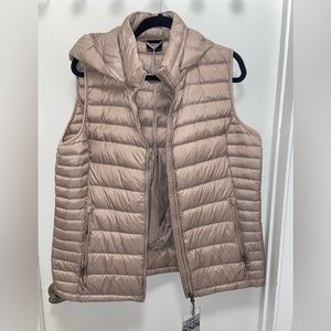 Macys puffer vest, brand new